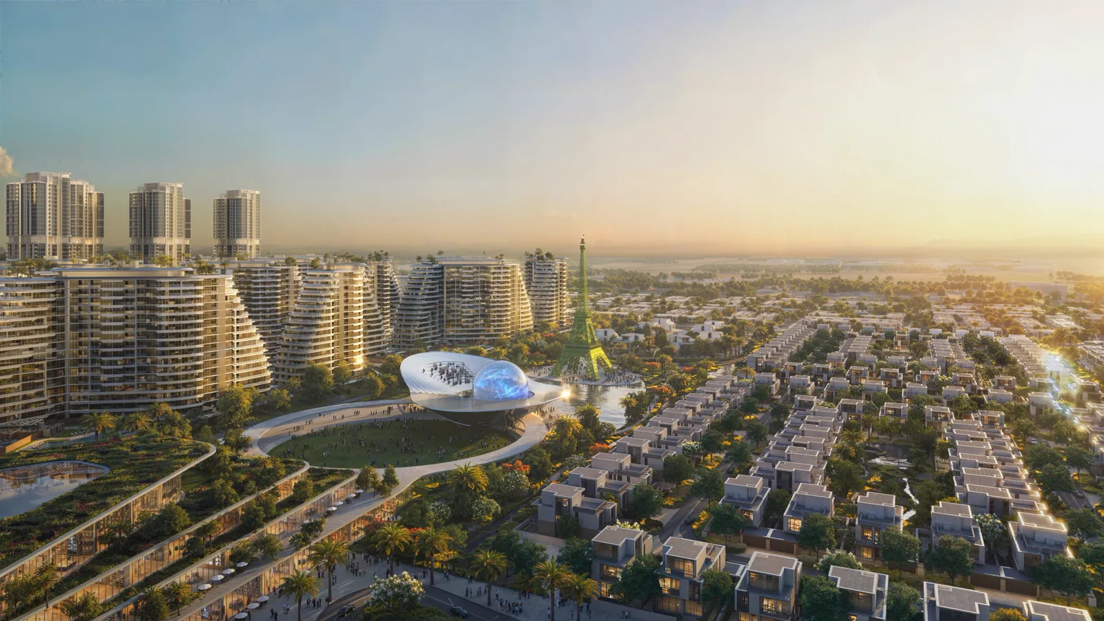 Official Waada masterplan still — high-rise towers, cascading mid-rises, villa streets and Eiffel replica around a lake