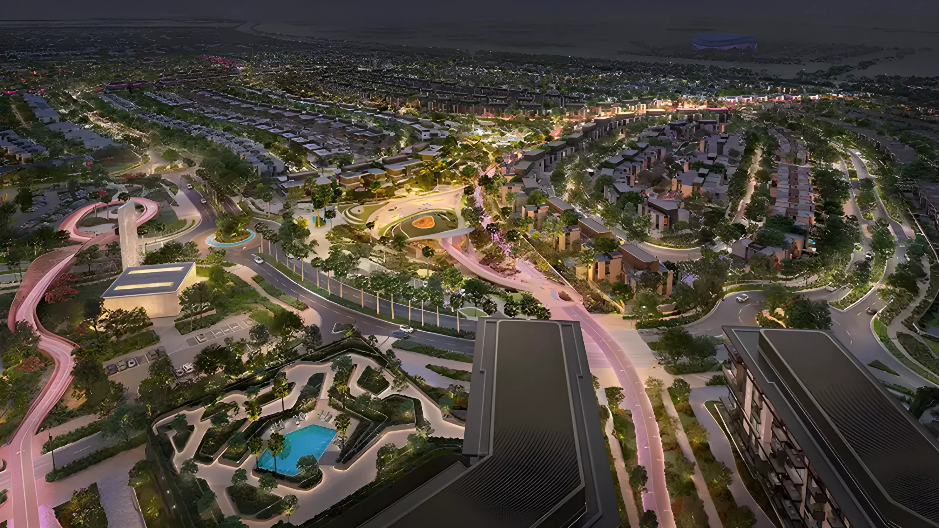 Rise by Athlon — night aerial from the apartment cluster looking over Athlon villa streets