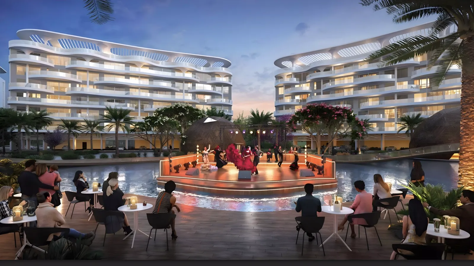 Lagoon Views 12 at DAMAC Lagoons — Property Finder evening still of two curved apartment blocks around a water amphitheatre