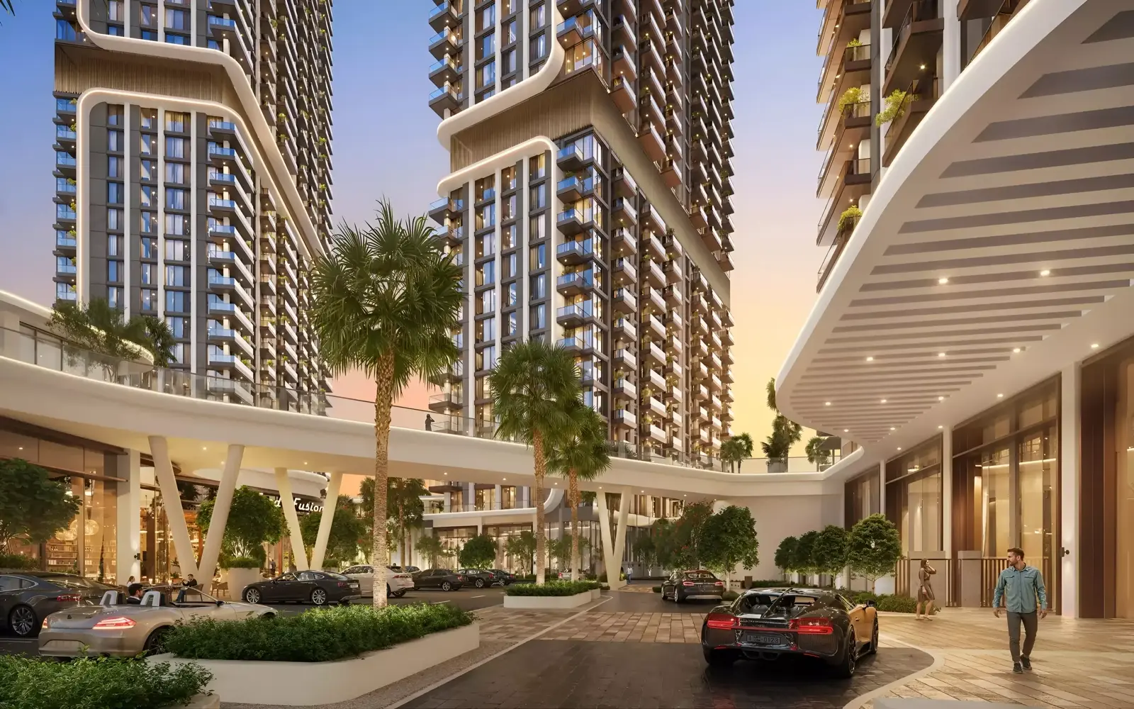 Mirdad Motor City — street-level podium and tower façades marketing still