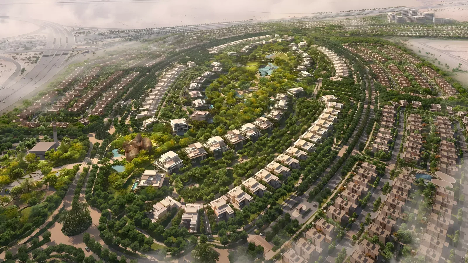 Shared The Wilds masterplan aerial — crescent villa streets around a central park, not a Nura-only plot map