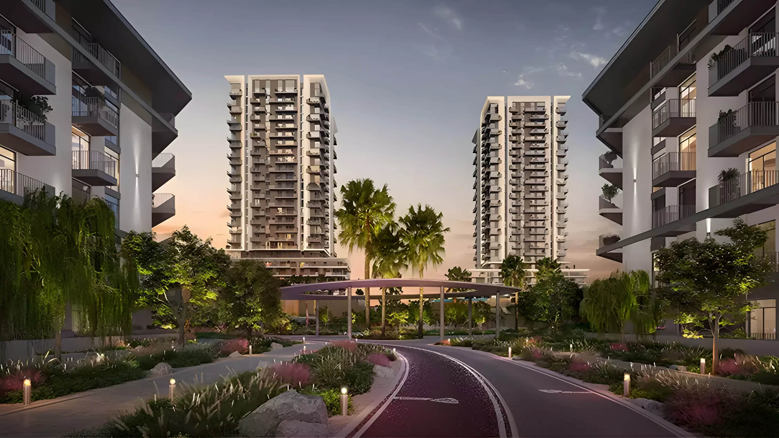 Rise by Athlon — dusk street still of two apartment towers over a landscaped cycle path
