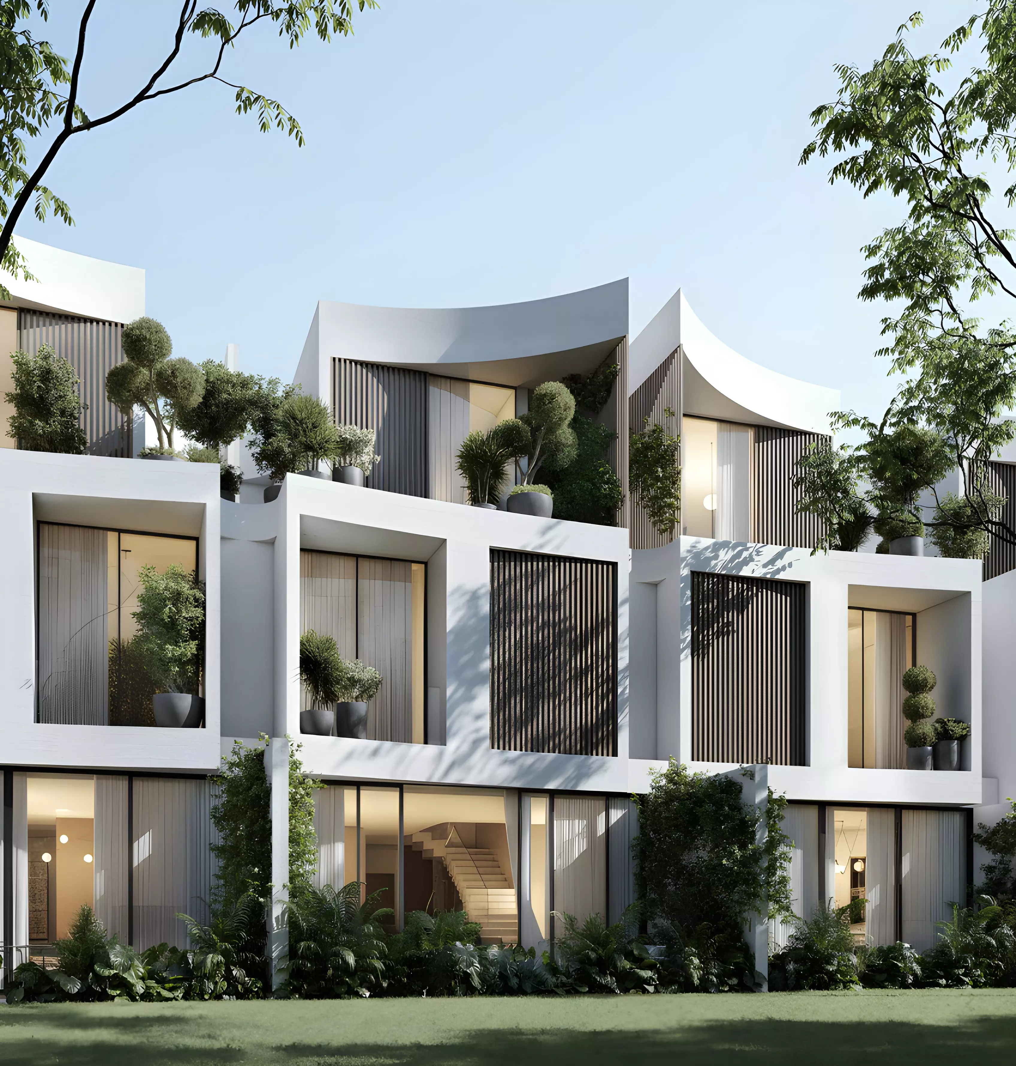 The Rise at Lunaya — garden-side daytime facade with curved roof forms